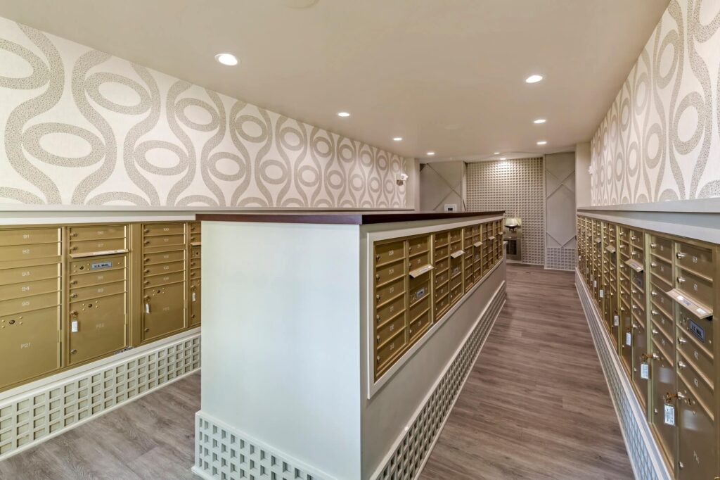Mail room with package lockers and water fountain