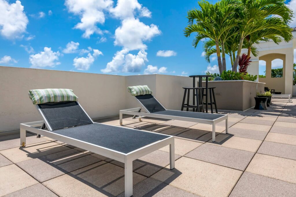 rooftop sundeck with reclining deck chairs